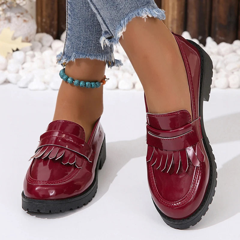 Norella | Dames elegante loafers met glansfinish | Zwart