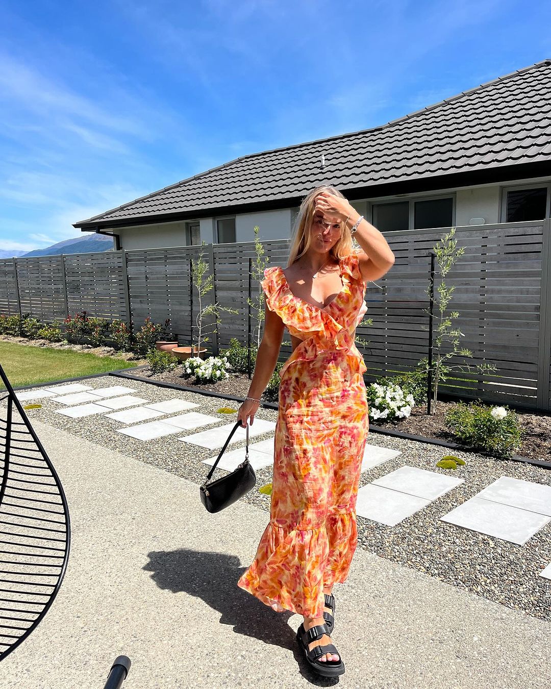 Sienna | Dames lange zomerjurk met uitsneden | Oranje
