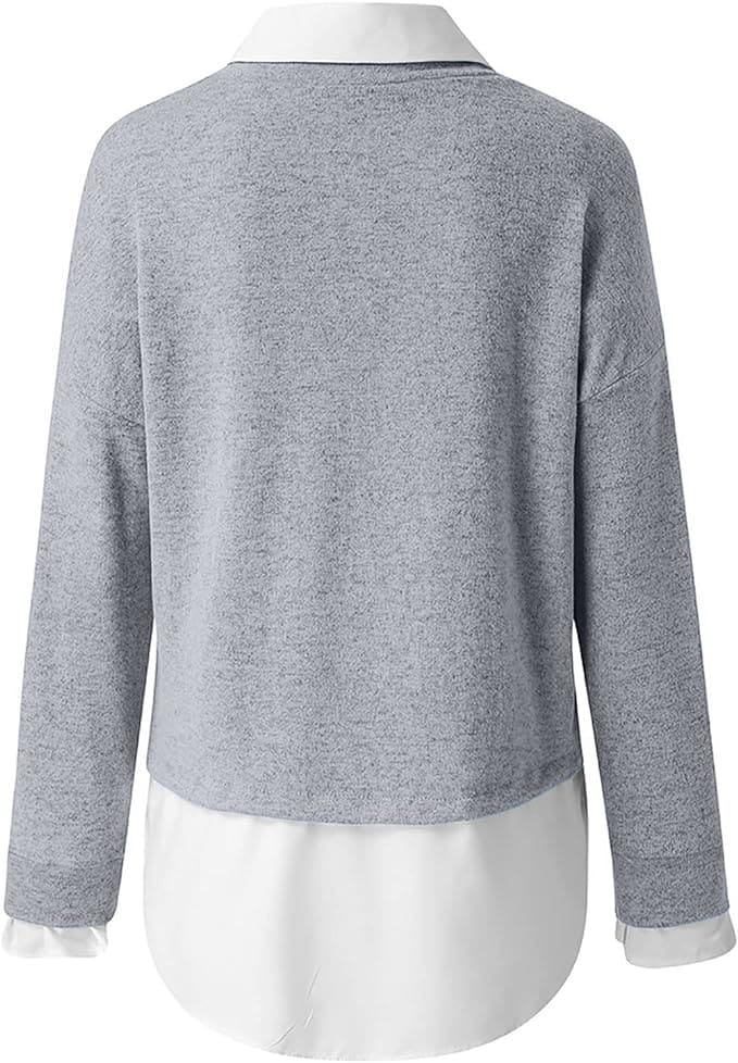 Vrouw draagt een elegante trui met witte kraagdetails.