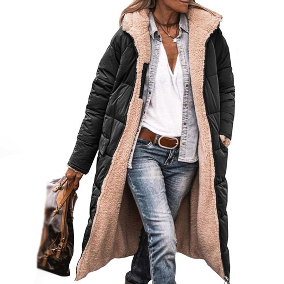 Shopie Lange winterjas voor dames, perfect voor koude dagen. Deze comfortabele en stijlvolle jas heeft een zachte voering en is ideaal te combineren met casual outfits. Een must-have voor een warme en modieuze uitstraling in de winter.