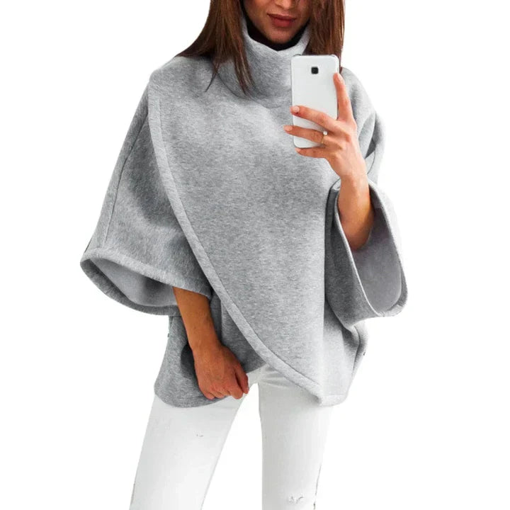 Zachte en ademende poncho met een trendy design.
