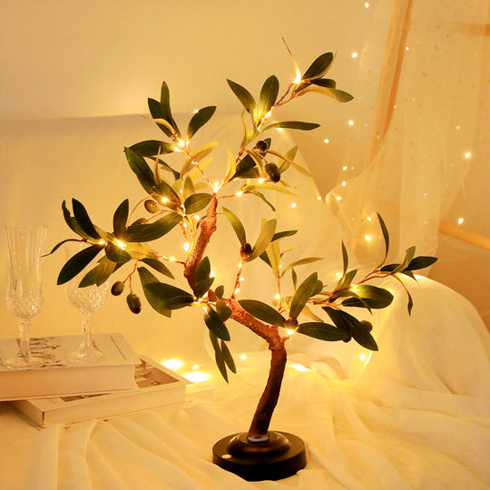 BrilloBeam lamp met een artistieke olijftak vorm, een prachtige lichtbron voor jouw interieur.
