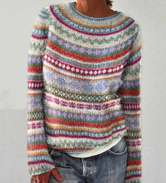 Vintage geïnspireerde gebreide trui gecombineerd met denim jeans.