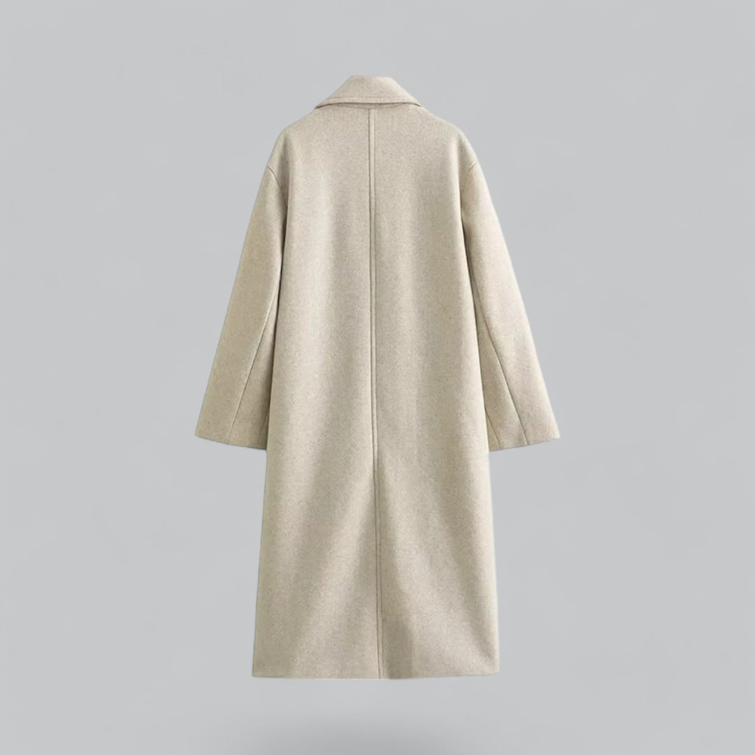 Oversized dames mantel met dubbele knoopsluiting en brede revers.