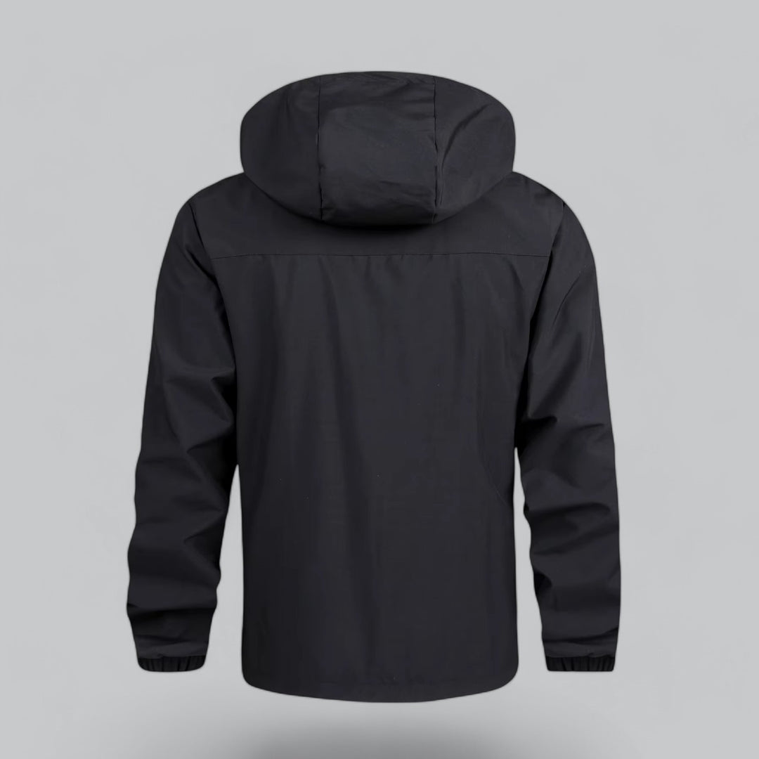 Winddicht herenjack met elastische manchetten voor extra bescherming.