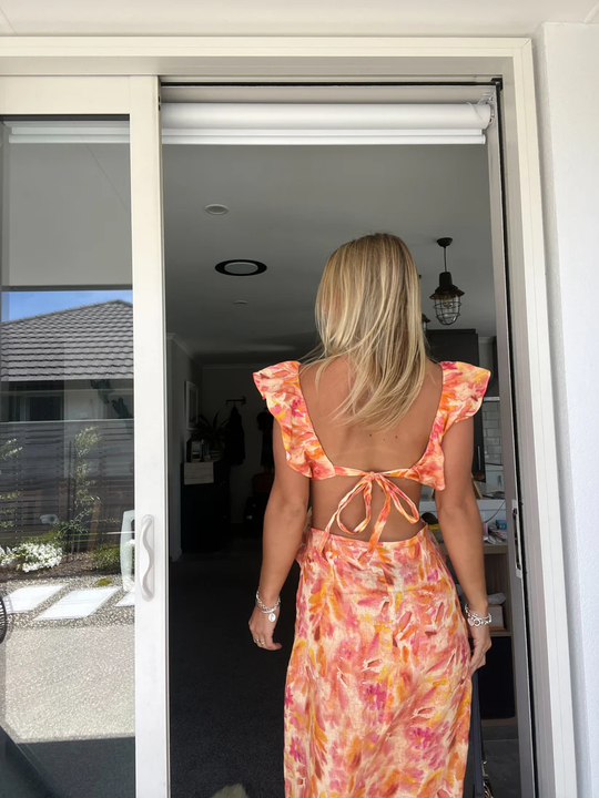 Sienna | Dames lange zomerjurk met uitsneden | Oranje