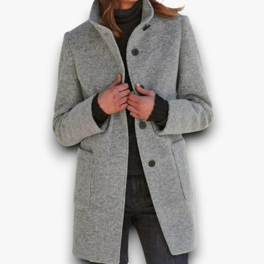 Stijlvolle damesjas met knopen, perfect voor een chique look.