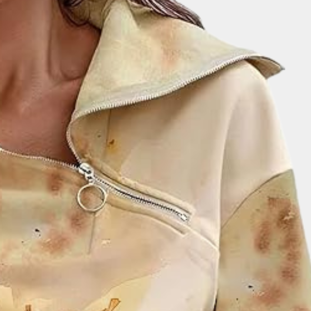 Stijlvolle herfsttrui voor dames met een bladerenprint.