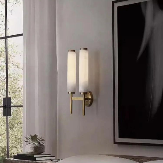 Aurora | Gouden marmeren wandlamp | Goud